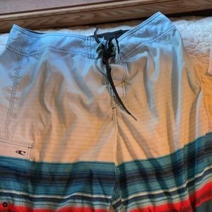 O’NEILL Men’s Red, White, and Blue Board Shorts size 32.